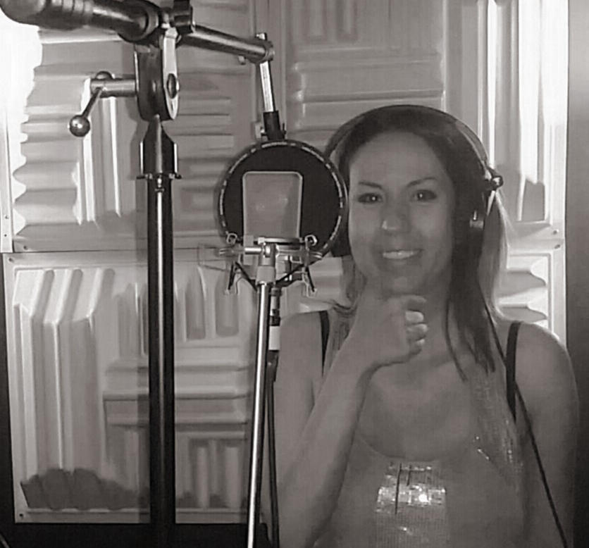 Edna Monique recording vocals in the studio